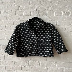 Black button up top with clouds